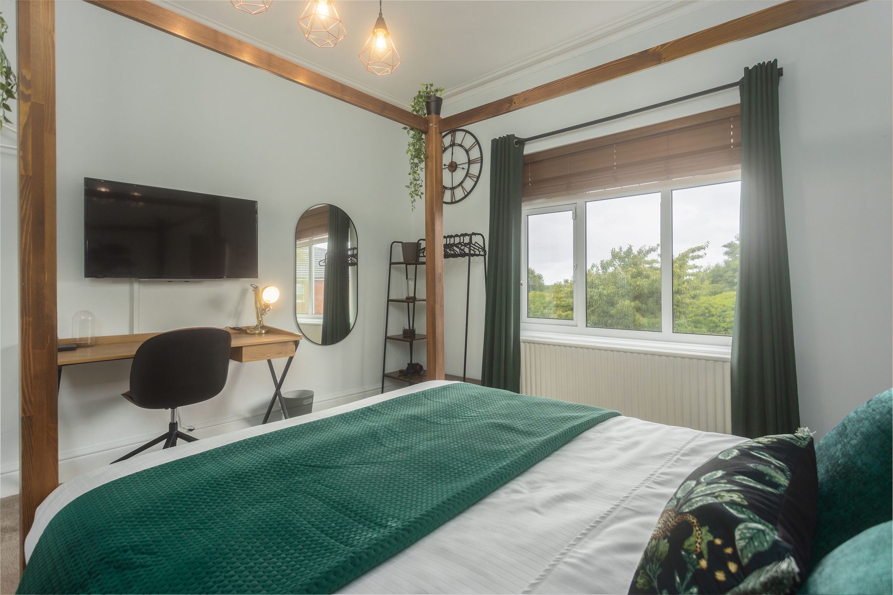 A wall-mounted bedroom television.